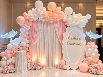 Peach and white christening backdrop with glowing butterflies